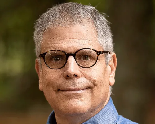 A dog owner turning a daily walk with their dog into donations for a local shelter by using WoofTrax